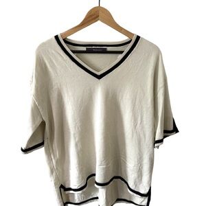 Chic V-Neck Cream Tee with Black Accents and matching shorts